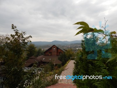 Mountain Panorama, Landscape And Buildings Stock Photo