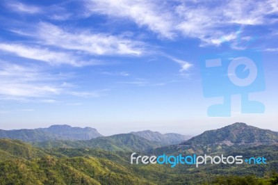 Mountain Range Under Cloud Blue Sky Stock Photo