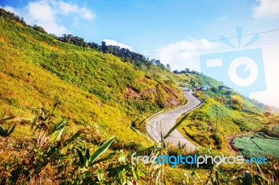 Mountain Road With The Sky Stock Photo