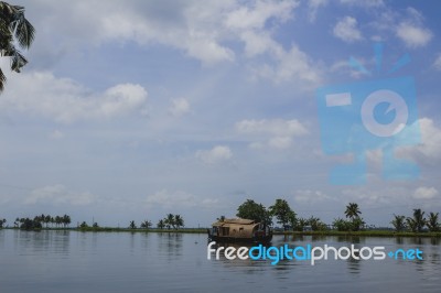 Moving House Boat On A River Stock Photo