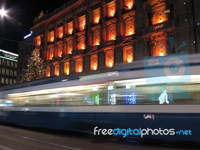 Moving Tram At Night Stock Photo