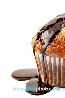 Muffin With Liquid Chocolate Stock Photo