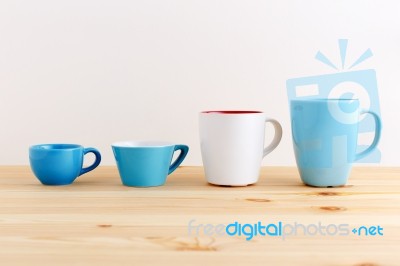 Mug And Cup On Wood Table Stock Photo