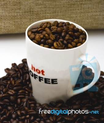 Mug Of Coffee Beans Stock Photo