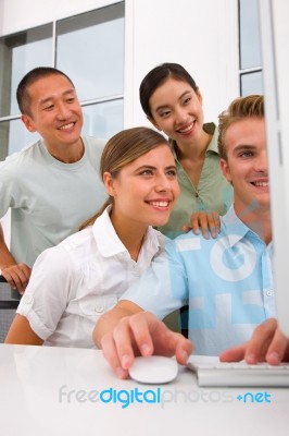 Multi Ethnic Group Of People Looking Computer Stock Photo