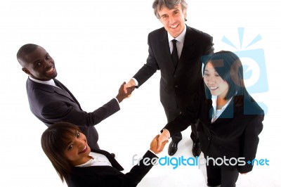 Multi Ethnic Team Hand Shaking Stock Photo