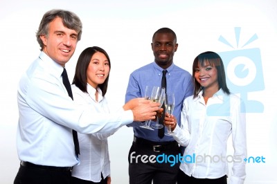 Multi Ethnic Team Toasting Stock Photo