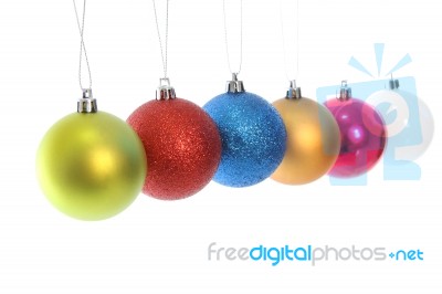 Multiple Hanging Christmas Ball On White Background Stock Photo