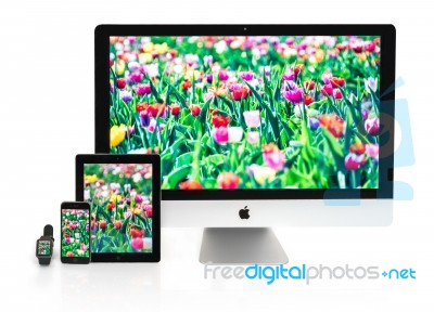 Multiscreen - Apple Watch, Iphone, Ipad And Imac Screens Stock Photo