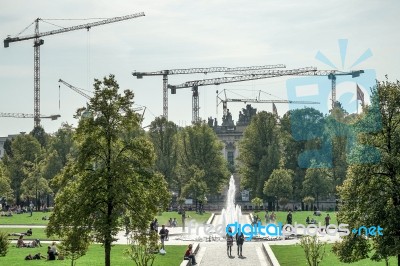 Multitude Of Cranes Towering Over The Gardens Of The Cathedral I… Stock Photo