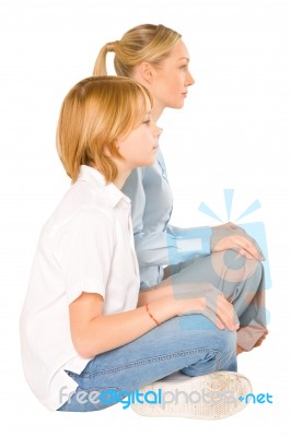 Mum And Son Sat On The Floor Smiling Isolated On White Backgroun… Stock Photo