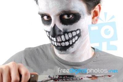 Murderer Skeleton Guy With A Bloody Knife Stock Photo