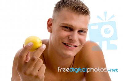 Muscular Male With Lemon Stock Photo