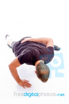 Muscular Man Doing Exercise Stock Photo