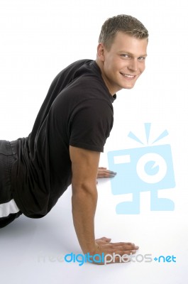 Muscular Man Doing Push Ups Stock Photo