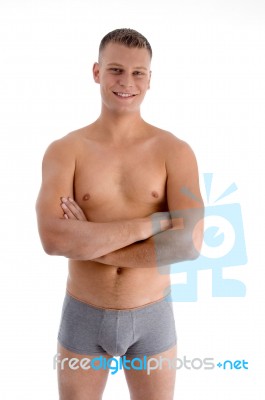 Muscular Man With Crossed Arms Stock Photo