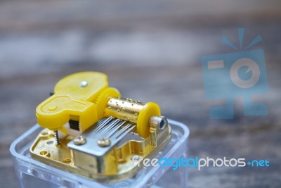 Music Box Tines Isolated On Wooden Background Stock Photo