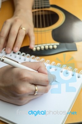 Music Composer Hand Writing Songs Stock Photo