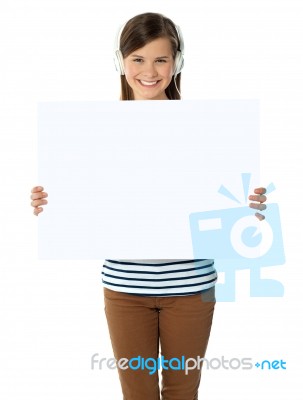 Musical Girl With Blank Banner Ad Stock Photo