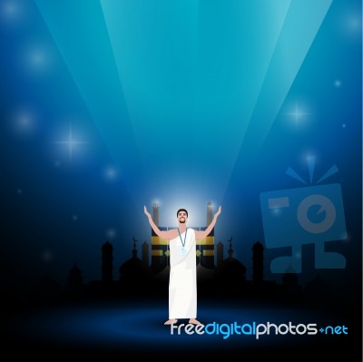 Muslim Man Wearing Ihram Clothes For Performing Hajj Or Umrah Pilgrimage On A Blue Background Stock Image