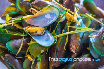 Mussels Steamed With Herbs And Lemon Grass -  Hot And Spicy Seafood Sauce , Thai Food Stock Photo