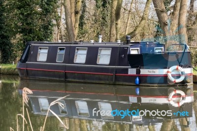 Narrow Boat On The River Wey Navigations Canal Stock Photo