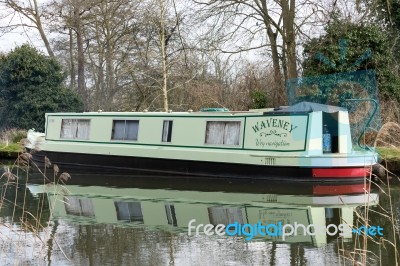 Narrow Boat On The River Wey Navigations Canal Stock Photo