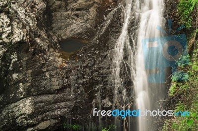 Natural Bridge Waterfall Stock Photo