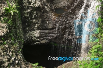 Natural Bridge Waterfall Stock Photo