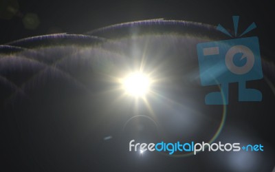 Natural Lens Flare.lens Flare Light Over Black Background. Easy To Add Overlay Or Screen Filter Over Photos Stock Image