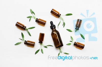 Natural Sage Essential Oil With Sage Leaves On White  Background… Stock Photo