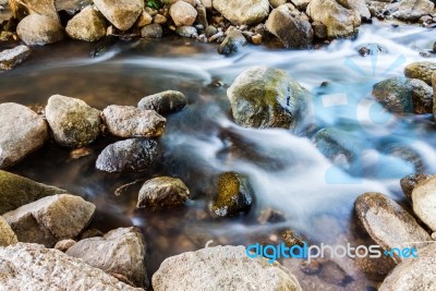 Nature Small Waterfall With Rock Stock Photo