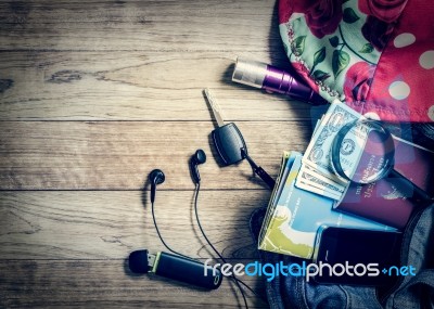 Necessary Object For Travelers In Denim Handbag Stock Photo