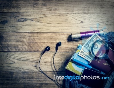 Necessary Object For Travelers In Denim Handbag Stock Photo