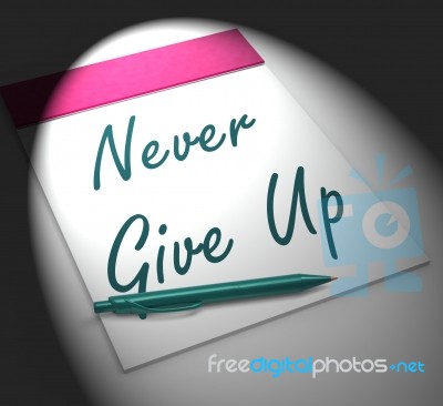 Never Give Up Notebook Displays Determination And Motivation Stock Image