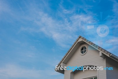 New House Gable Under Sky Stock Photo