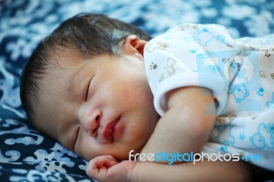 Newborn Baby Peacefully Sleeping Stock Photo