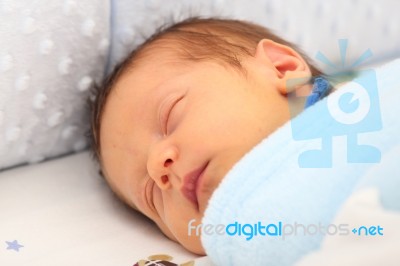 Newborn Sleeping Deeply Stock Photo