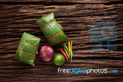 Nham Sour Pork In Banana Leaves Thai Food Stock Photo