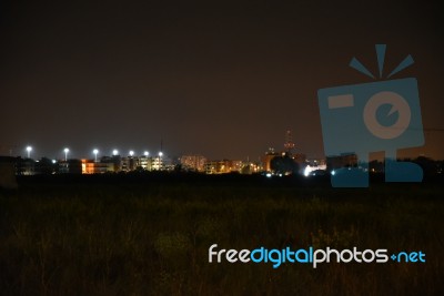 Night Public Park In The City With Houses Near Stock Photo