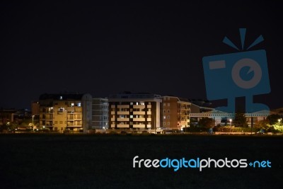 Night Public Park In The City With Houses Near Stock Photo