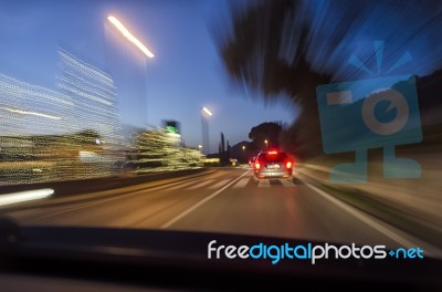 Night View Of A Car On Street Stock Photo