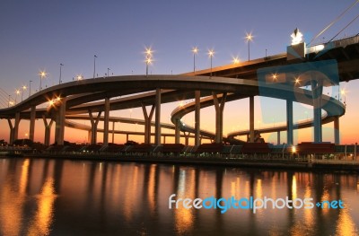 Night View Of Bhumibol Bridge In Thailand, Also Known As The Industrial Ring Road Bridge Stock Photo