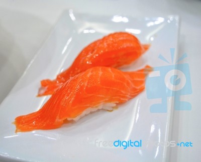 Nigiri Sushi On White Plate At Japan Restaurant Stock Photo