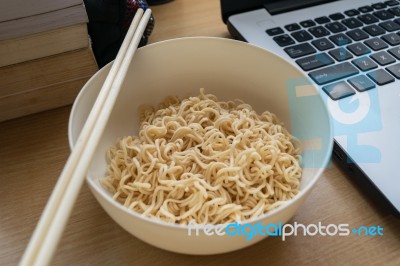 Nooddles On Table Wood Background With In Working Stock Photo