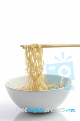 Noodle With Pinch Chopsticks Stock Photo