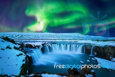 Northern Light, Aurora Borealis At Godafoss Waterfall In Winter, Iceland Stock Photo