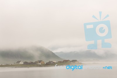 Norway Village In Clouds Of Fog. Cloudy Nordic Day Stock Photo