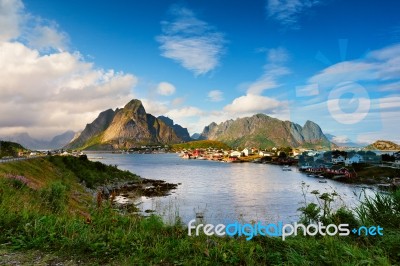 Norway Village On A Fjord. Nordic Cloudy Summer Day Stock Photo