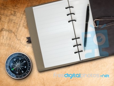 Note Book And Compass Stock Photo